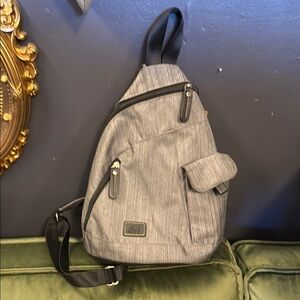 Roots Gray Backpack with Textured Fabric and Unique Shape